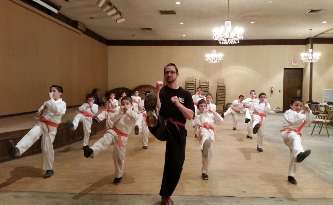 Frum Karate students training in the dojo